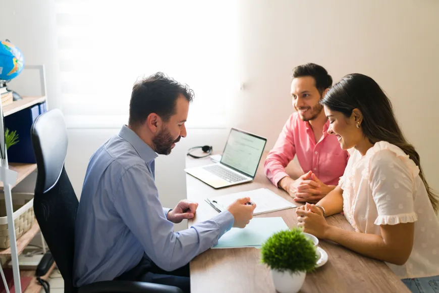 couple consulting a consultant looking for itin or ssn